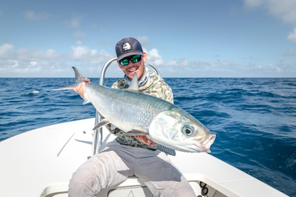 Angler holding a milkfish