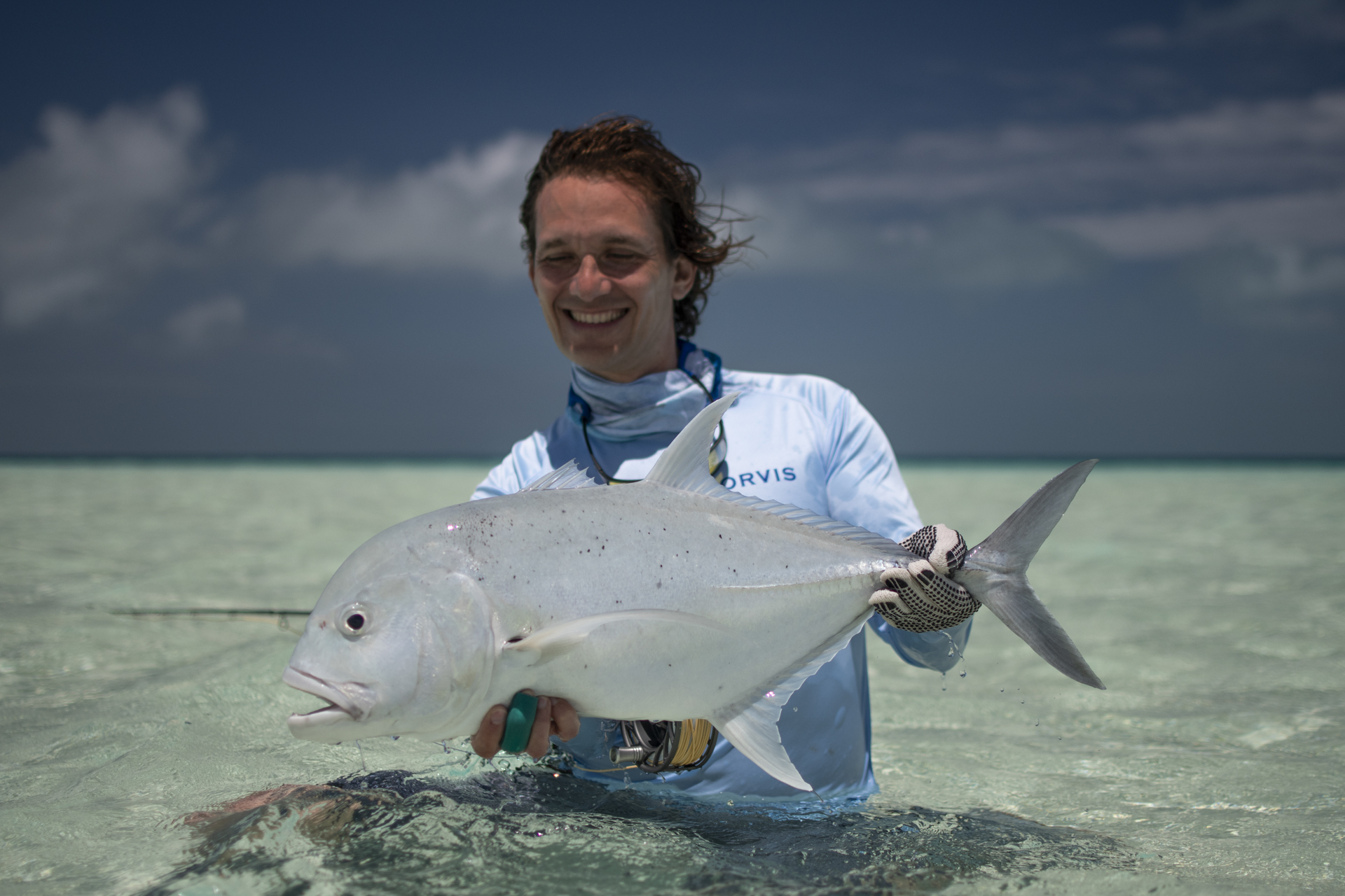 Angler with his GT catch at Farquhar Atoll