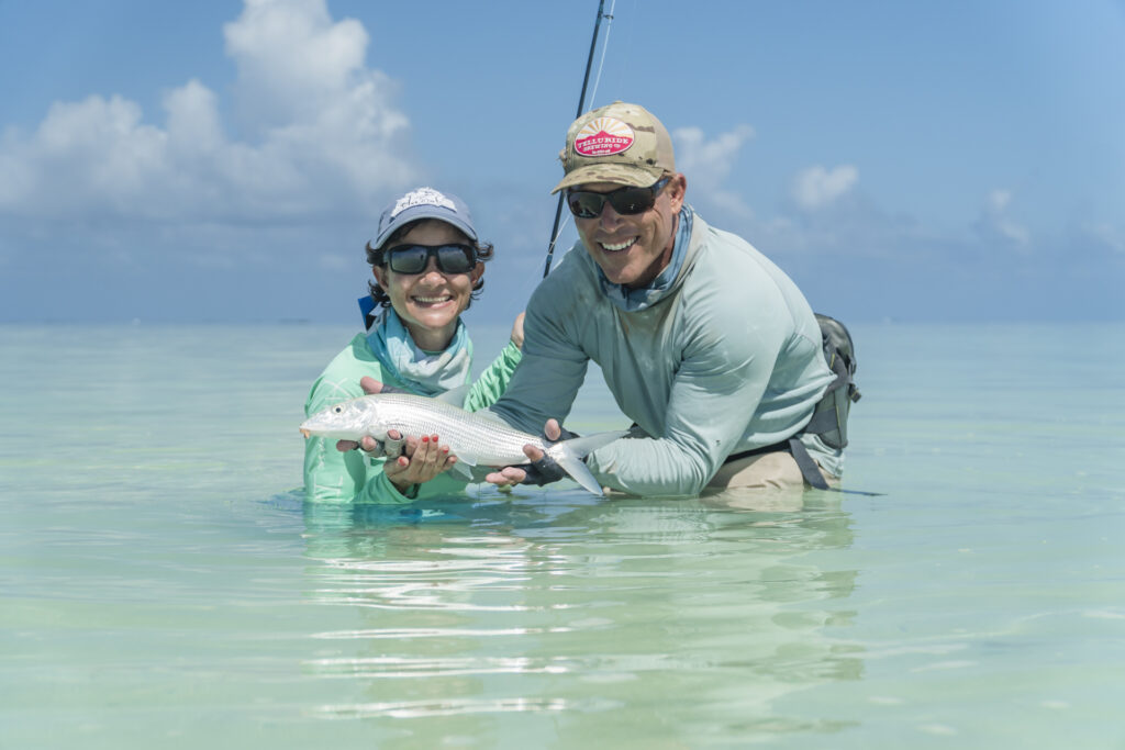 Angler fly fishing for bonefish