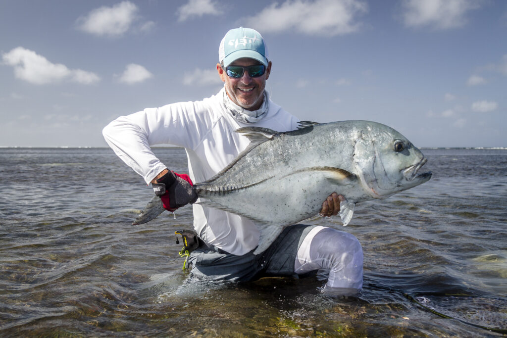 Angler with a GT in Seychelles