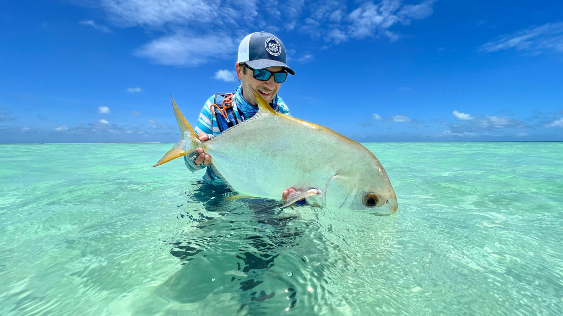 Austrian Outdoor Sports angler with his permit catch