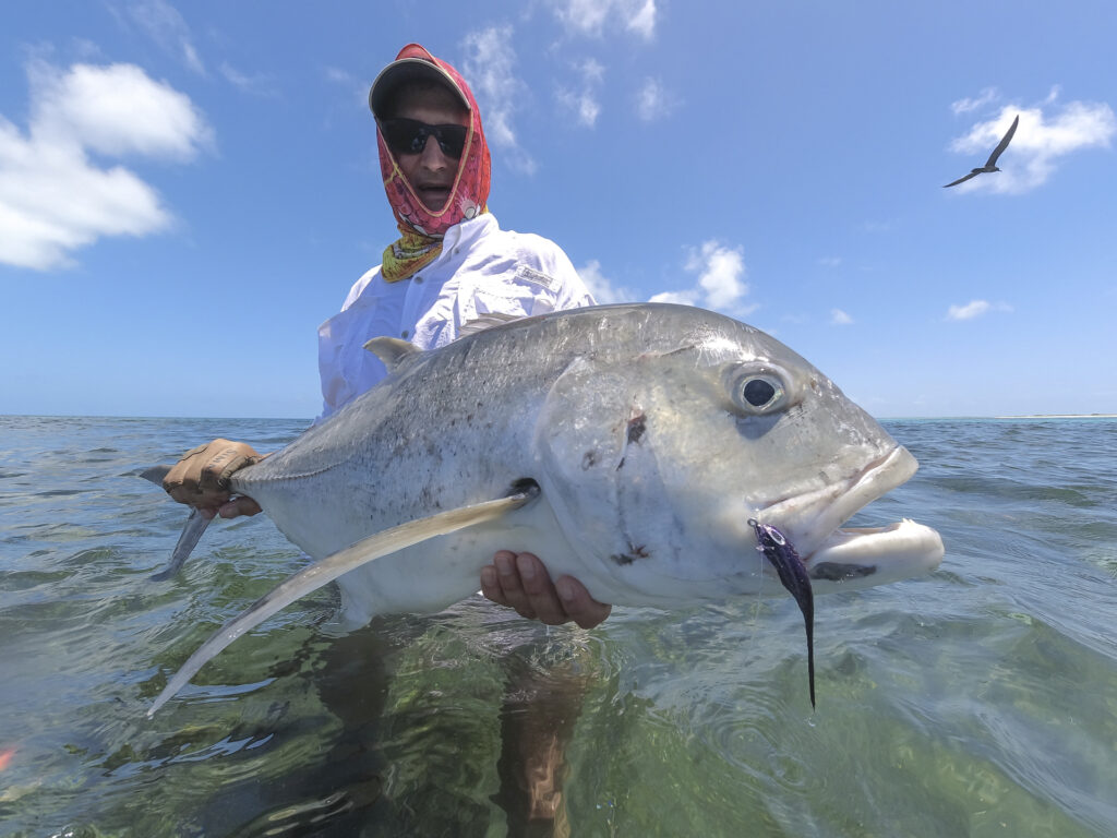 Angler with his GT catch