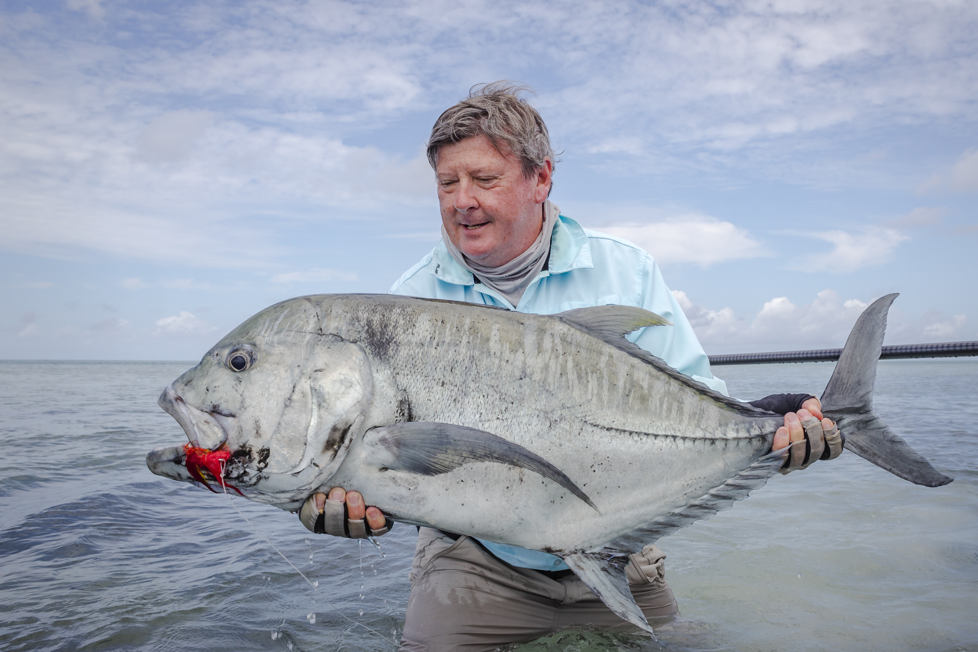 Angler with his GT catch