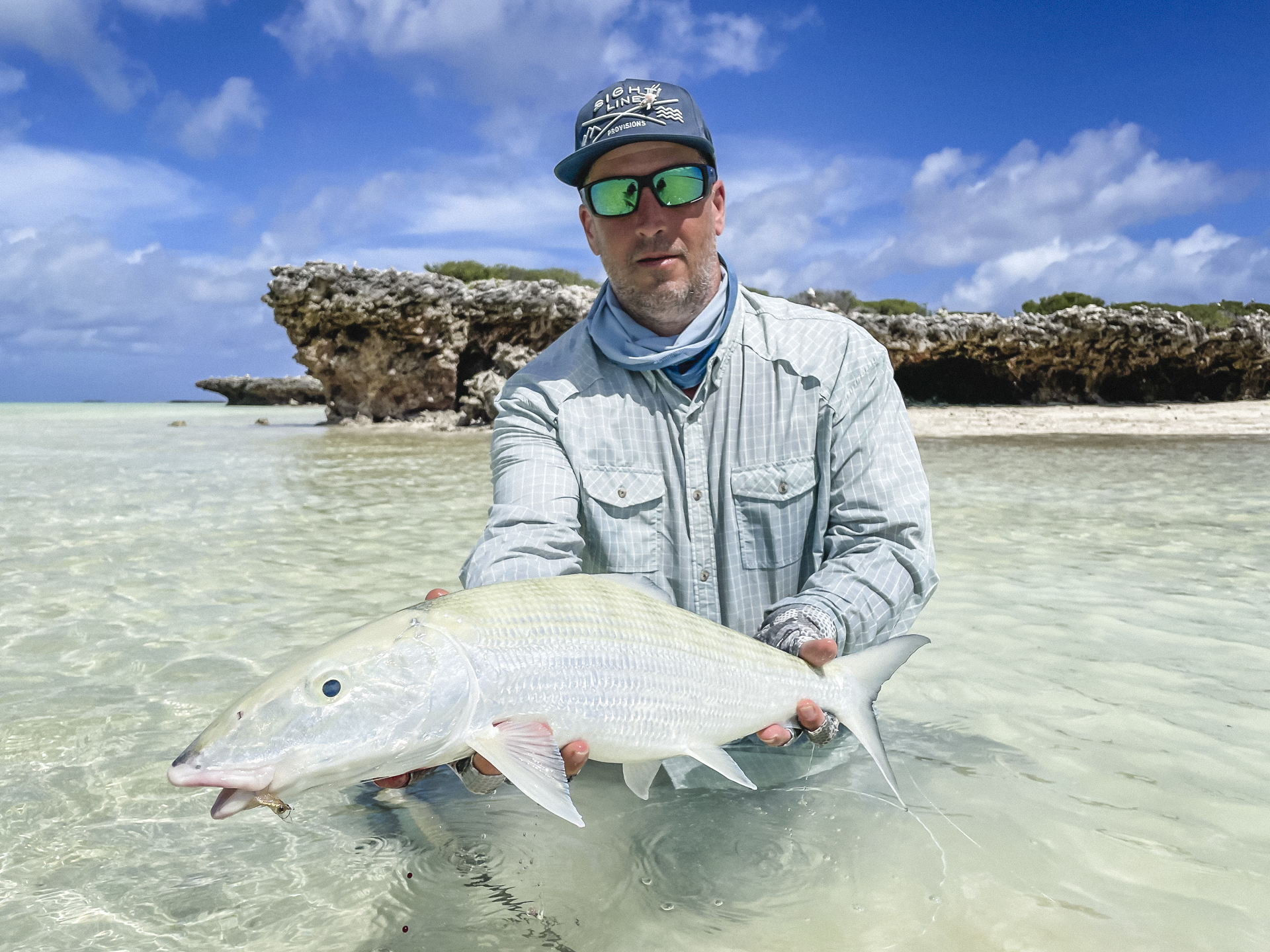 Angler showing off his bonefish catch