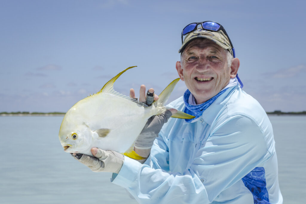 Angler holding a permit