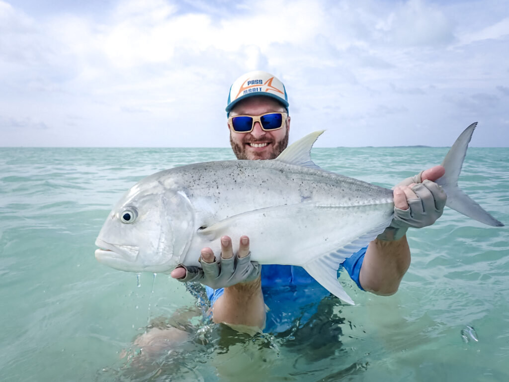 Fisherman showing off a GT caught at Alphonse