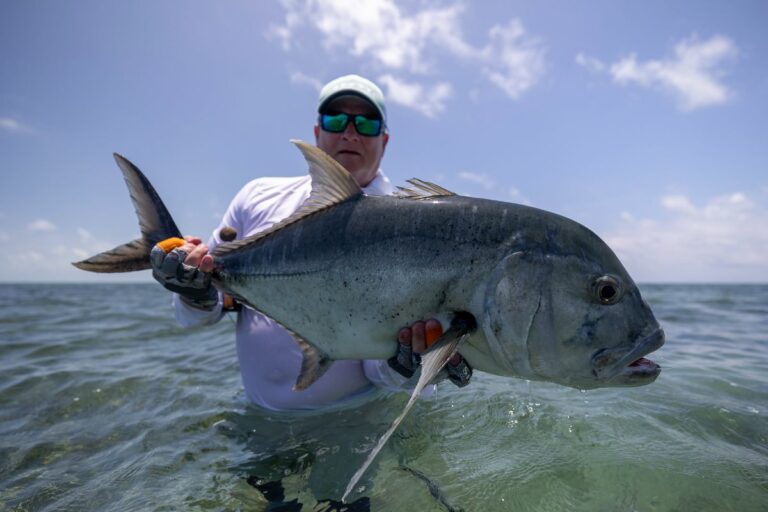 Angler with his catch on the same day two grand slams were made