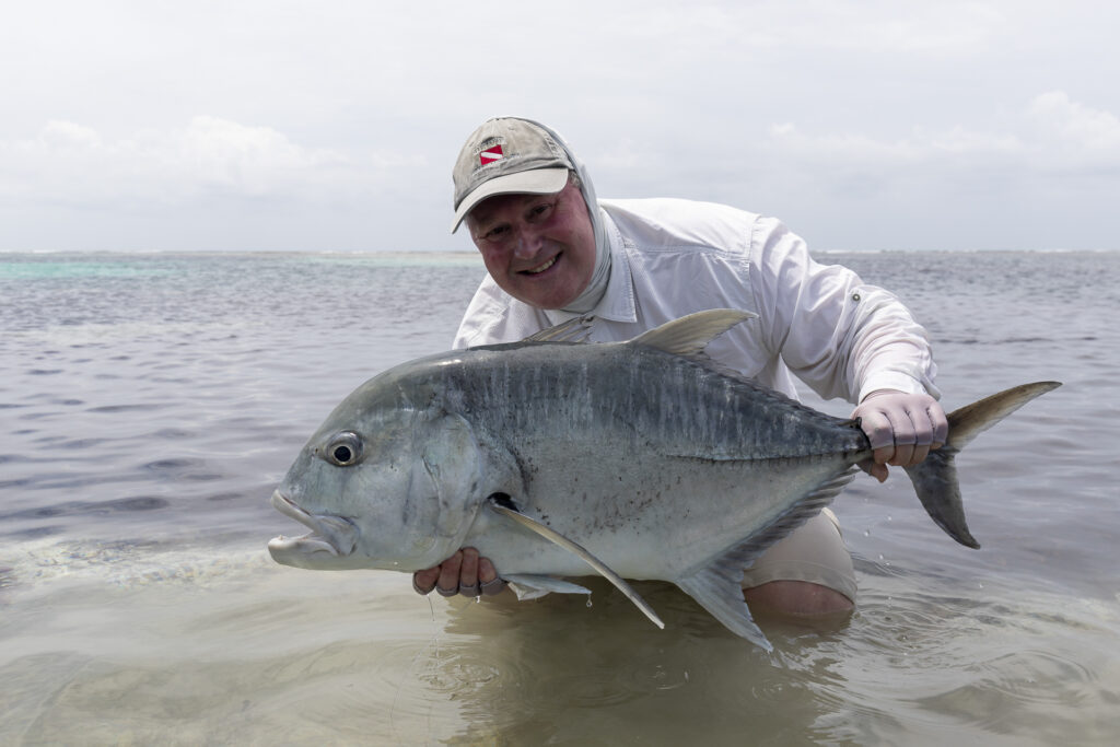 Angler with his catch at Farquhar Atoll