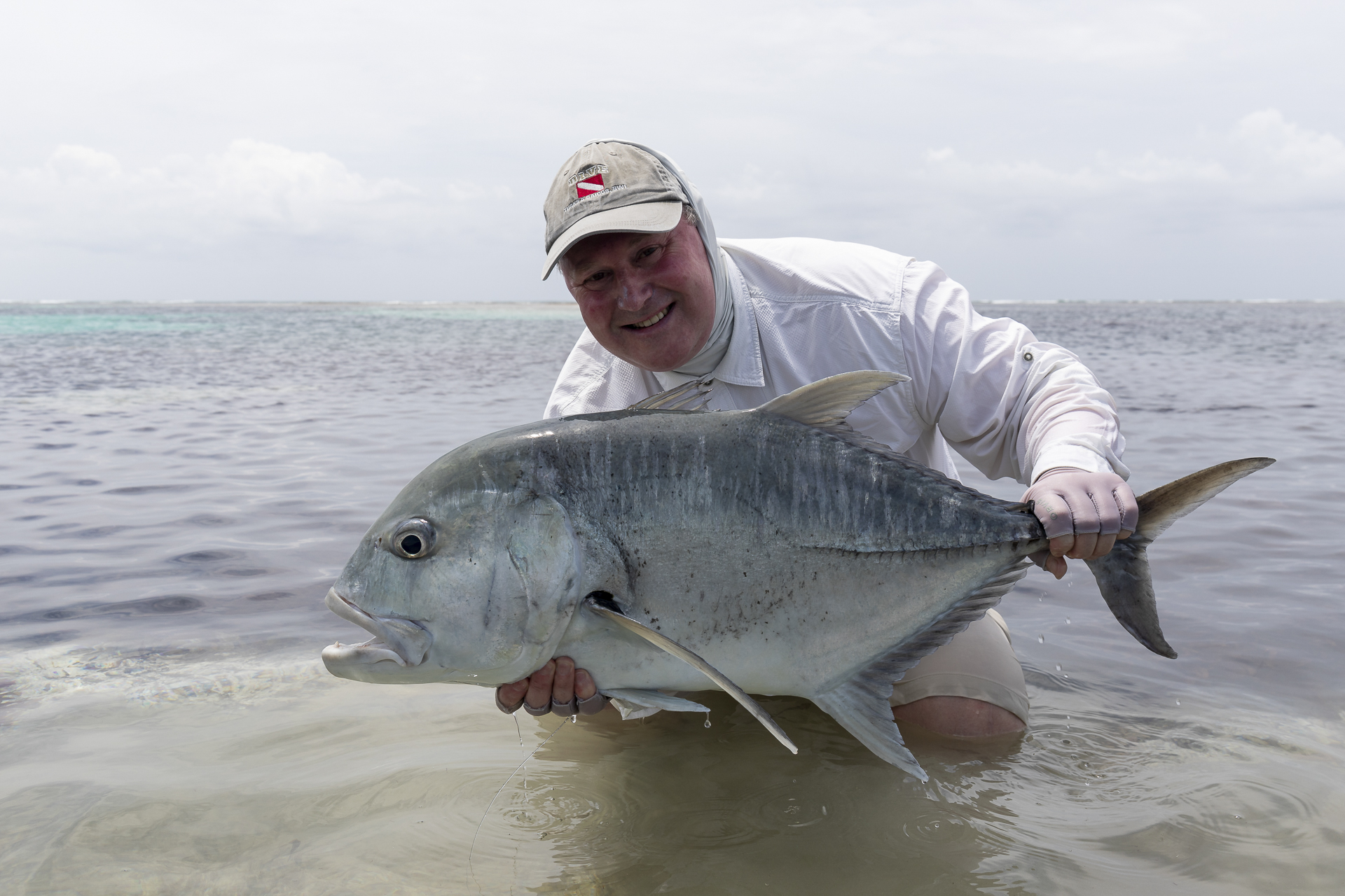 Angler with his catch at Farquhar Atoll