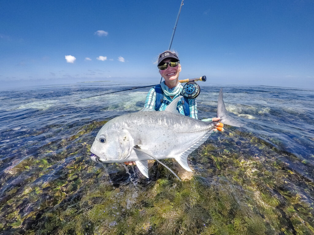 Angler with her catch - a large GT