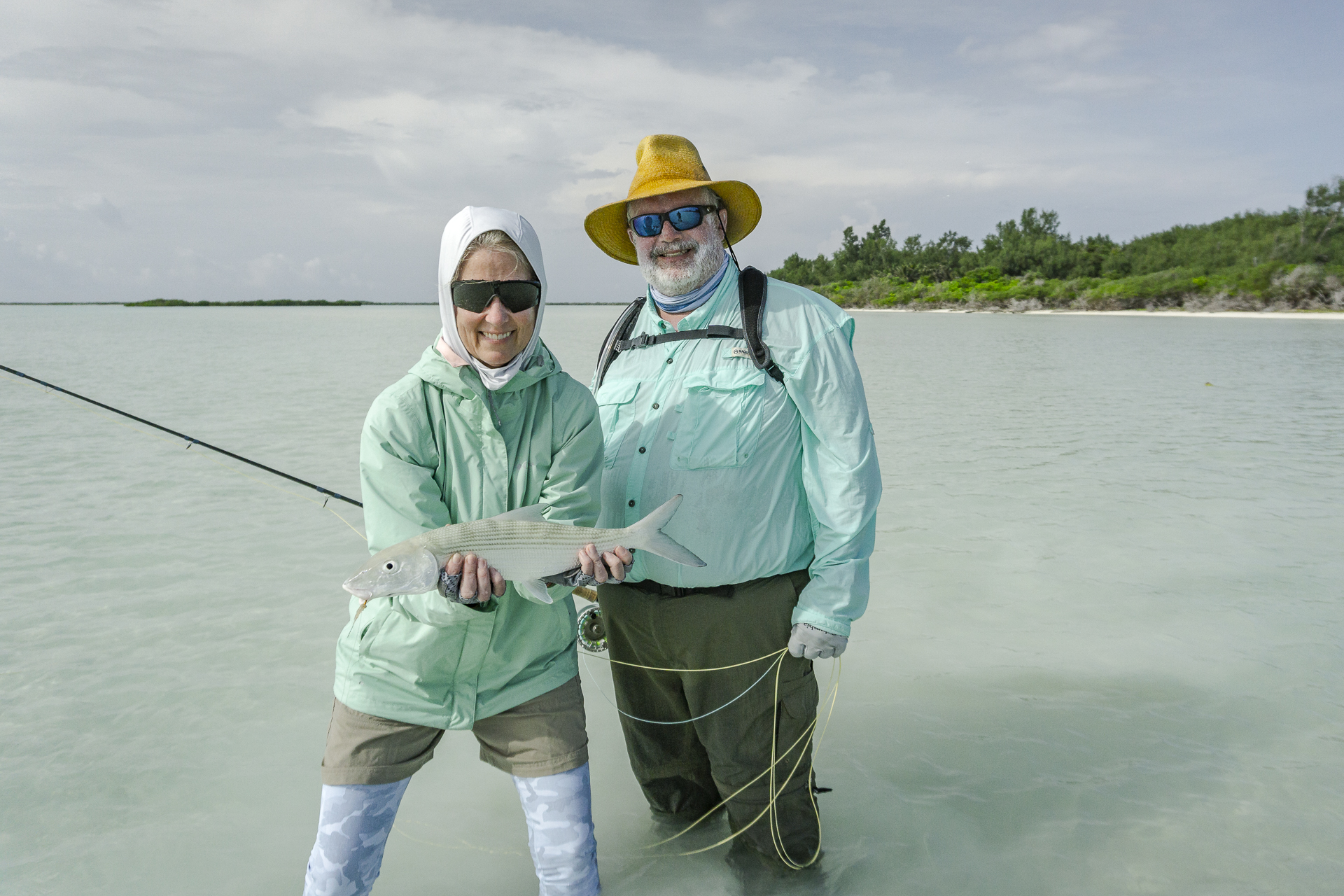 Anglers showing off the bonefish they caught
