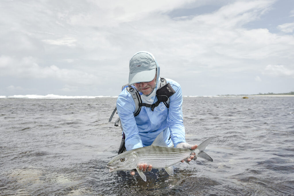 Angler releasing a bonefish