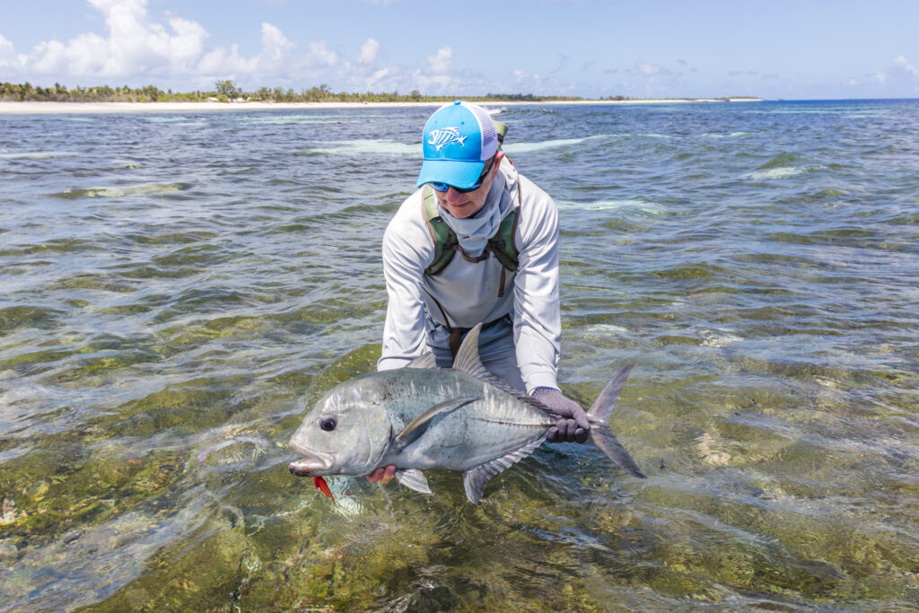 Fisherman releasing a GT