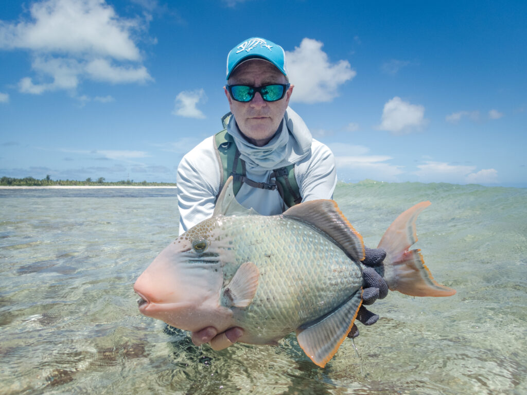 angler with a yellowmargin triggerfish