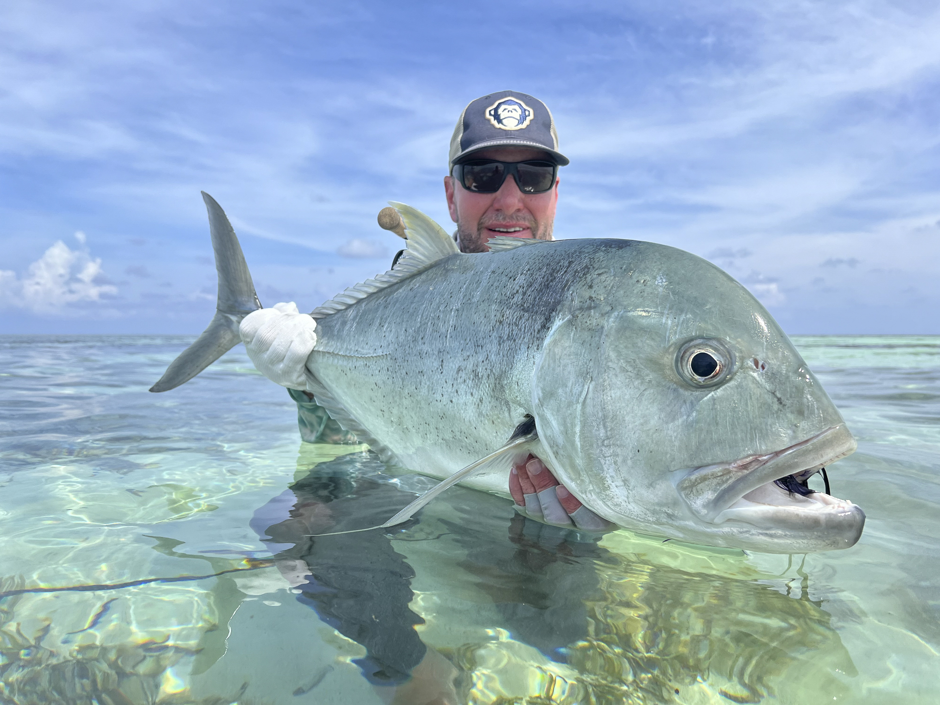 Large GT caught by fly fisherman at Cosmoledo Atoll