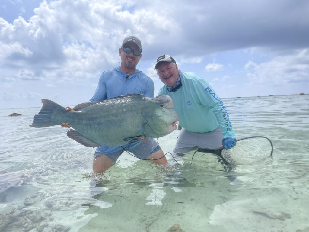 Anglers with a bumphead parrotfish