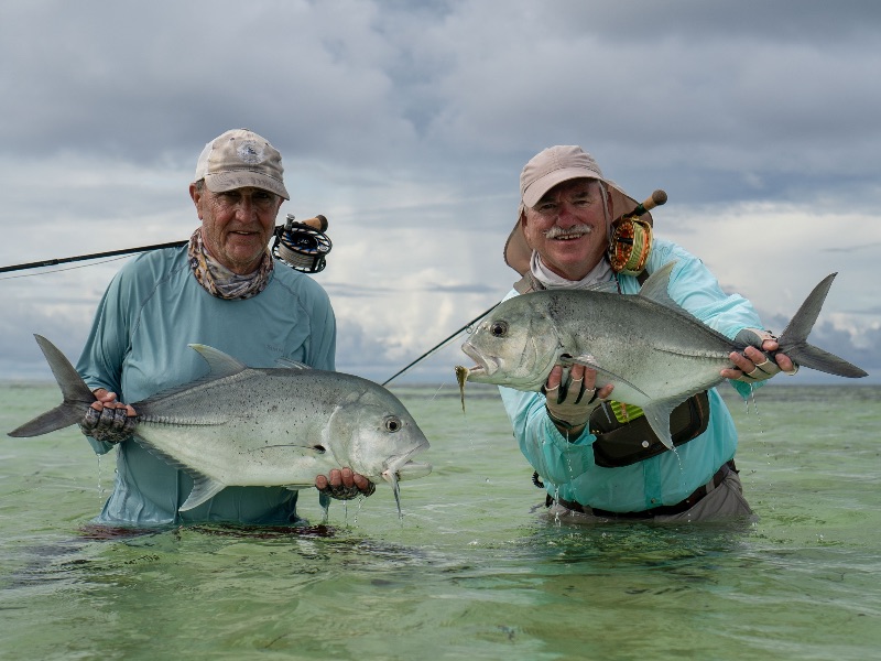 Two anglers with a GT monsters