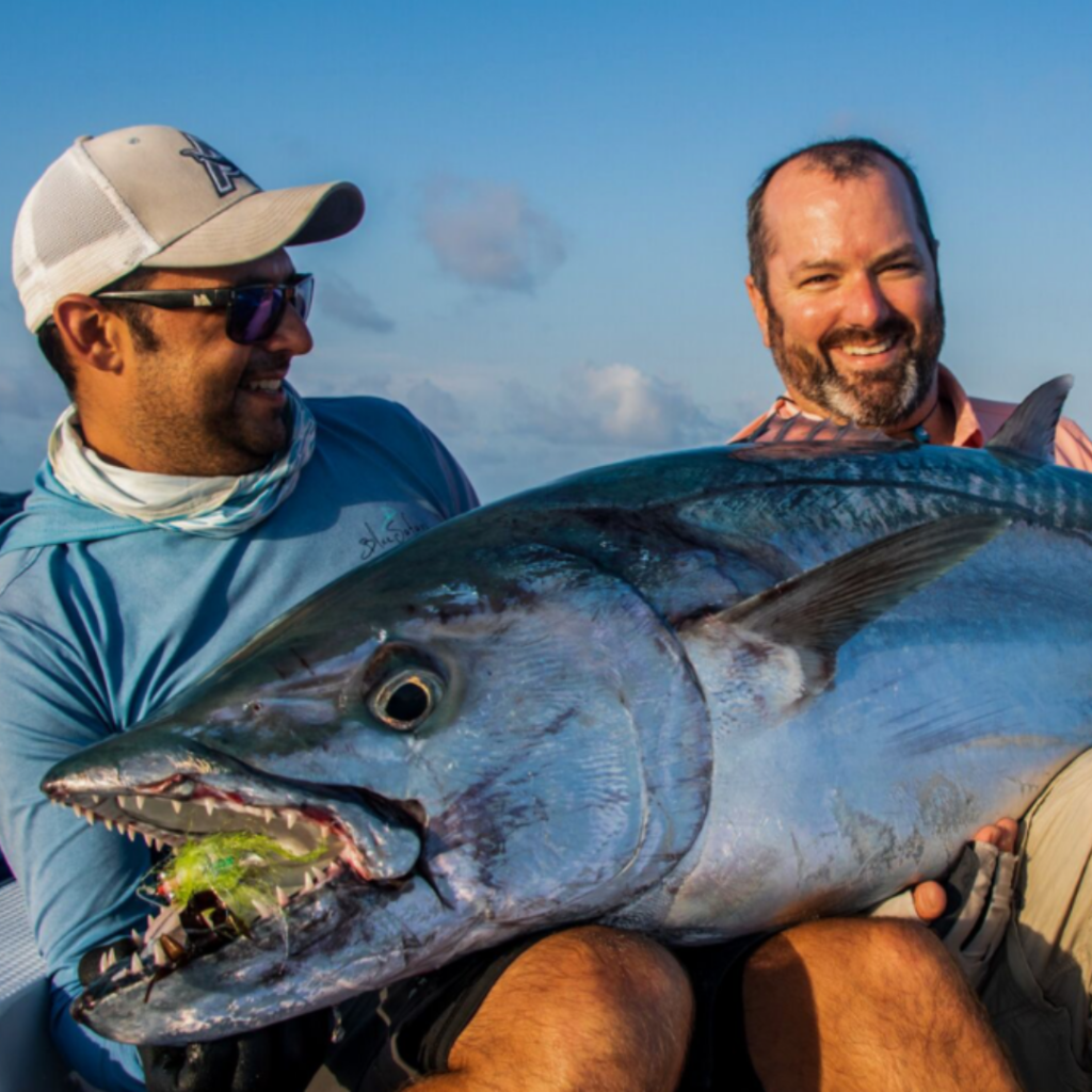 Two anglers with a doogwood tuna