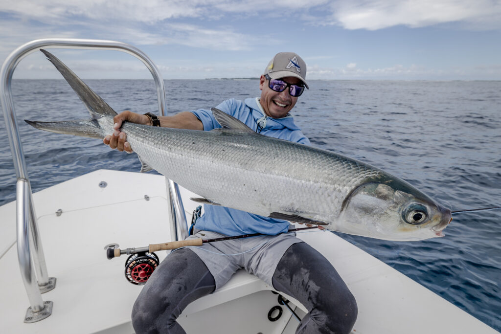 Angler at Alphonse Island with his catch