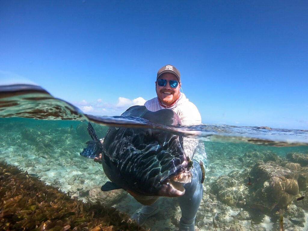 Angler releasing his catch - one for the scorecard