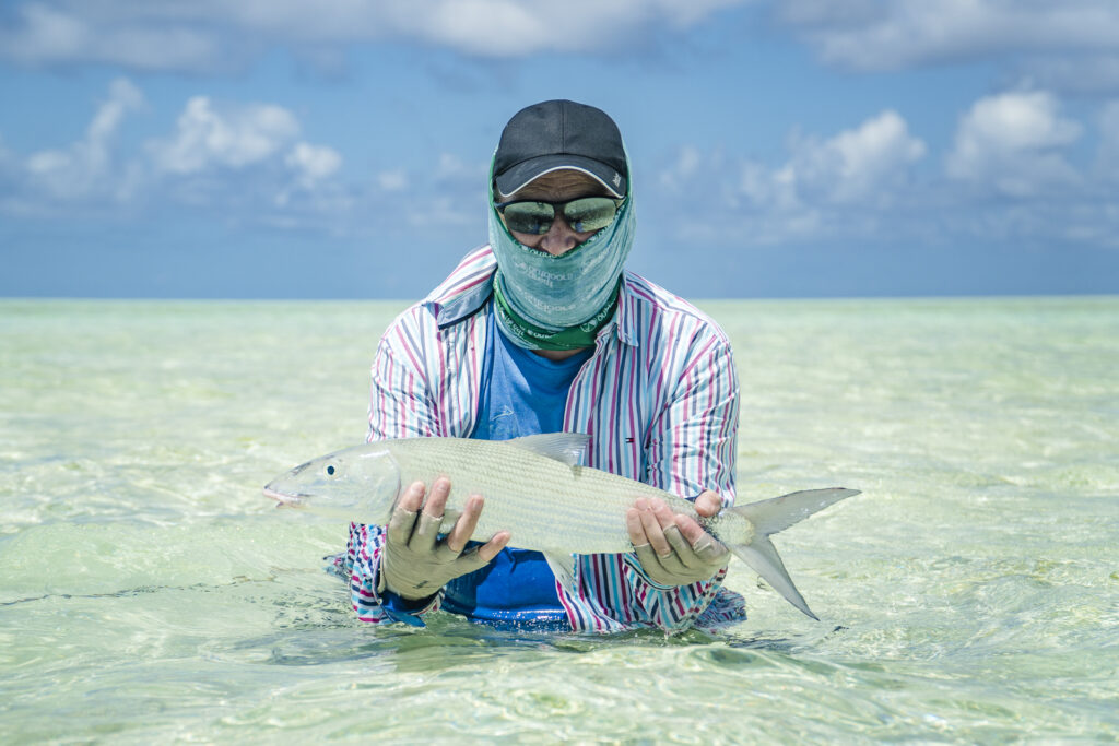 Angler with a bonefish in the Seychelles