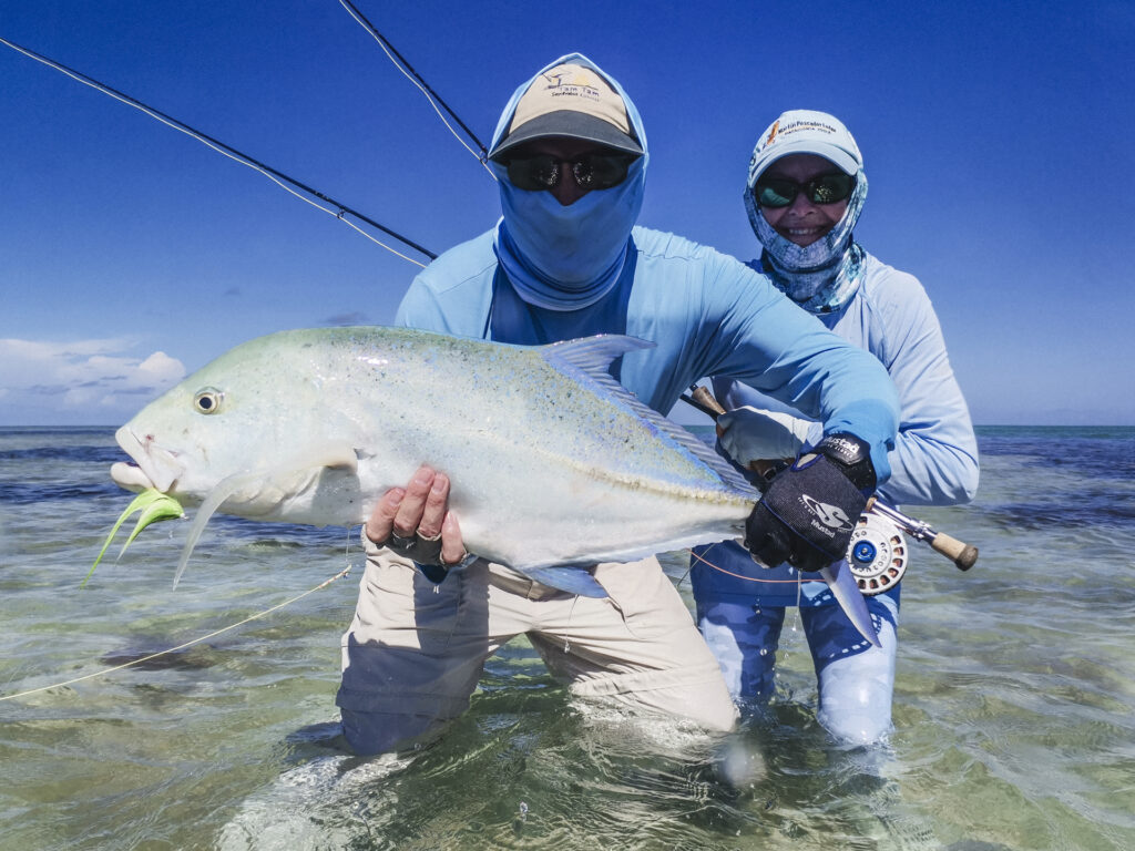 Anglers with their catch, a GT