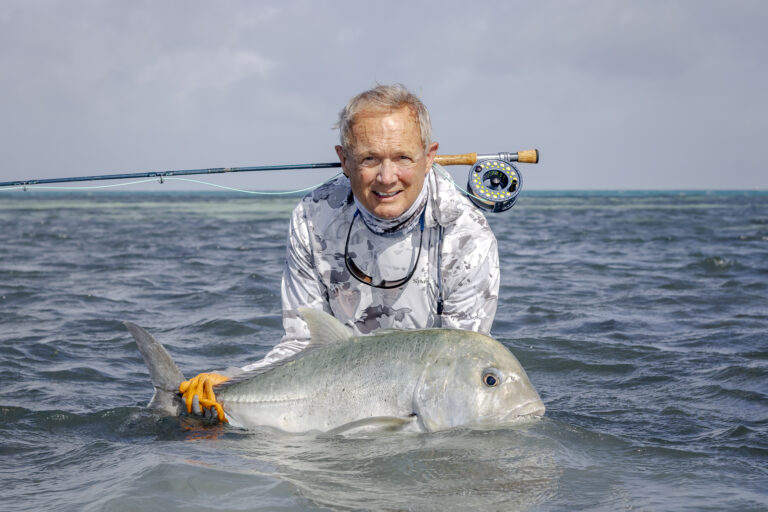 Fly fishing and catching a GT