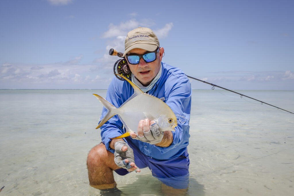 Angler holding a permit