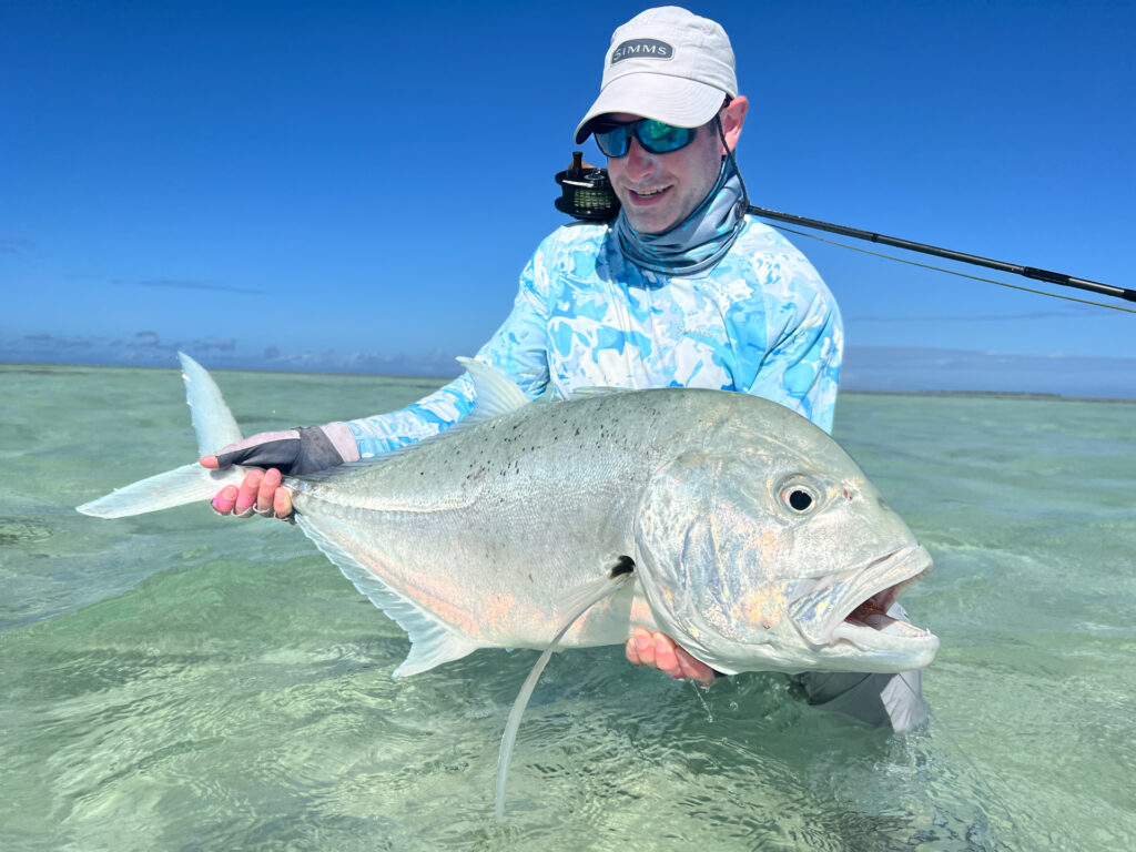 ANgler with Giant Trevally catch