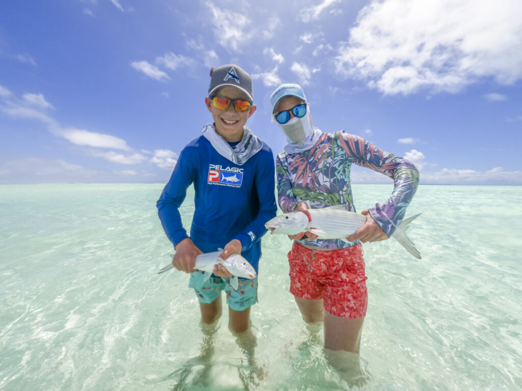 mother and son fishing at Alphonse Island on day one