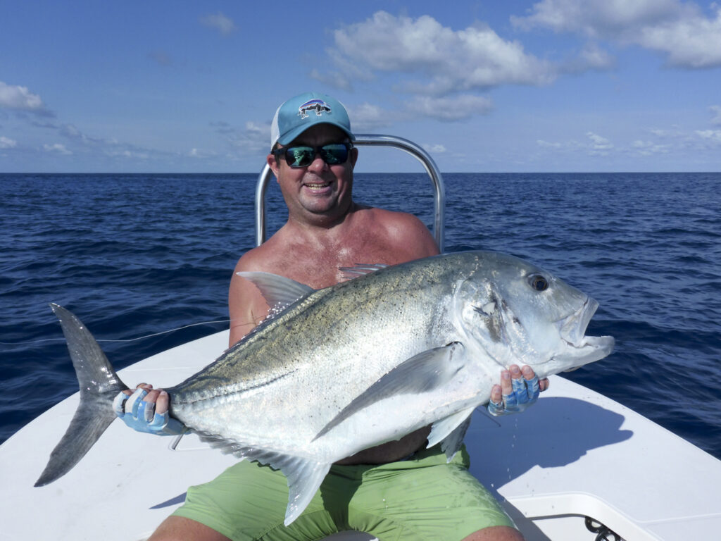 Angler with a giant trevally