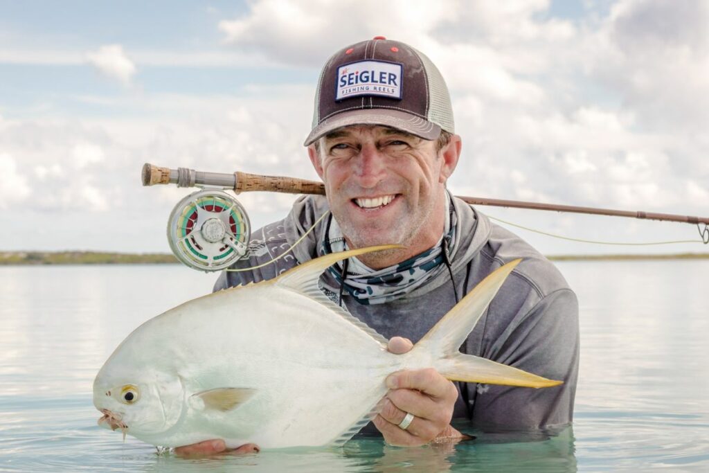 Angler at Astove making a catch in the lagoon