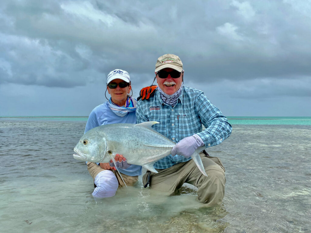 Pair of anglers with a catch at Alphonse Island