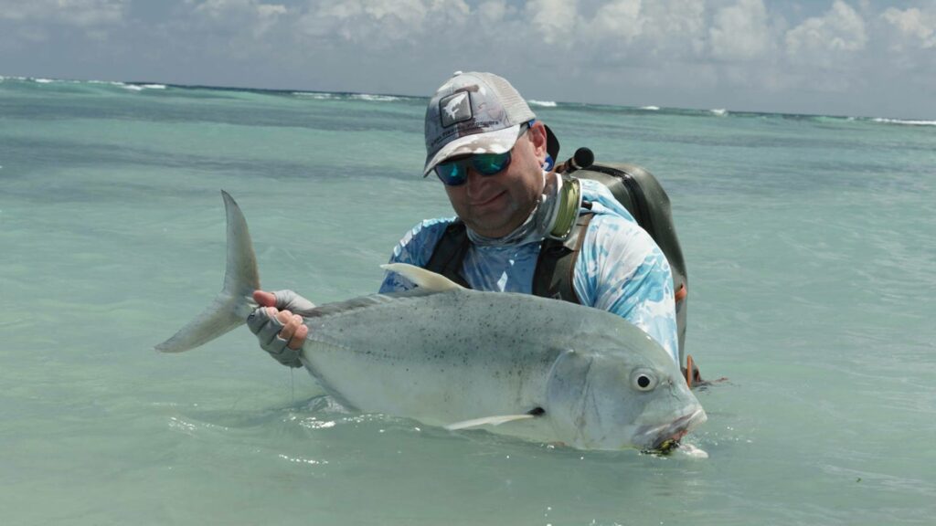 New saltwater anglers catching a GT
