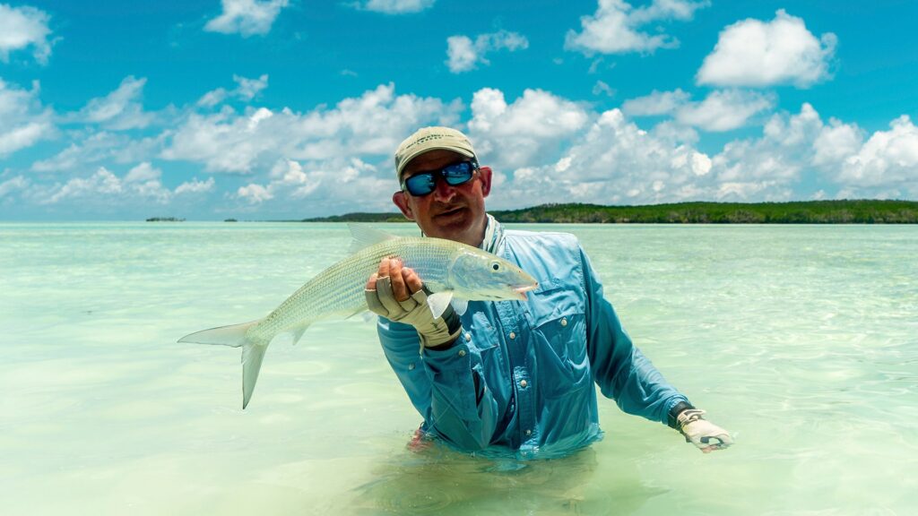 Bonefish hold up by an angler