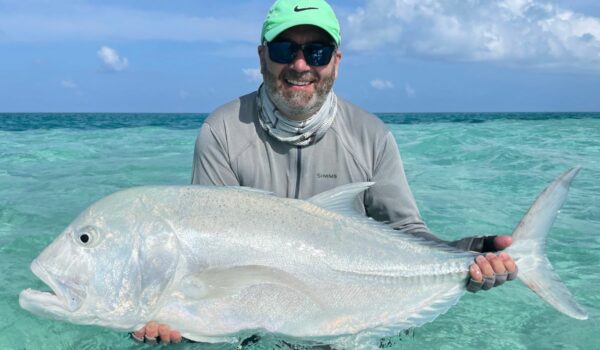 Angler with his catch during lovely sunny days