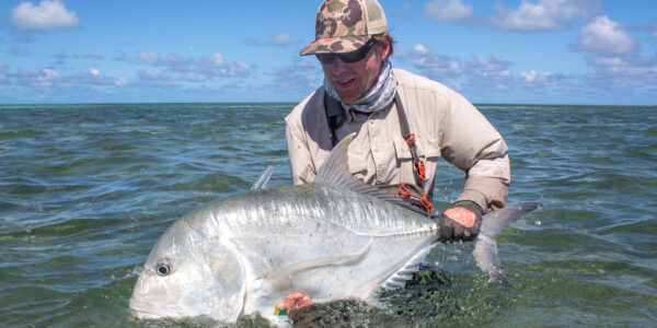 Angler with a GT at Cosmoledo Atoll