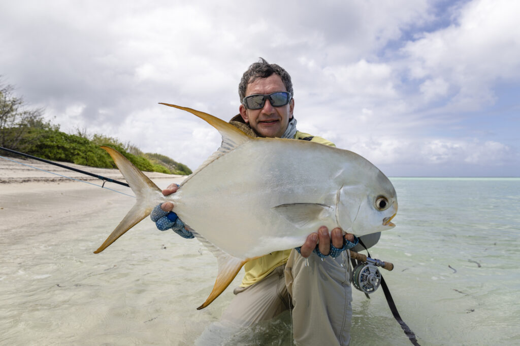 Angler with a permit catch