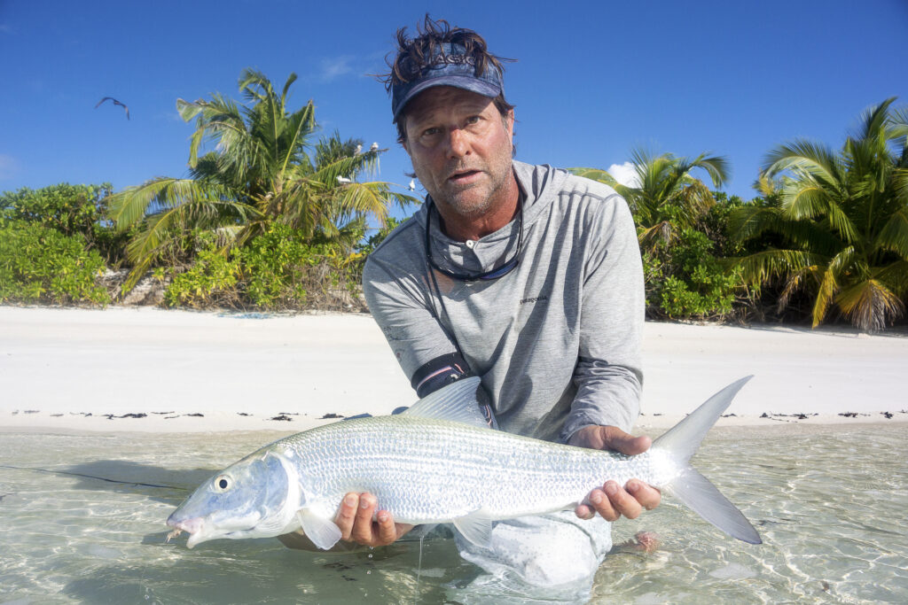 Man caught a bonefish in the Seychelles