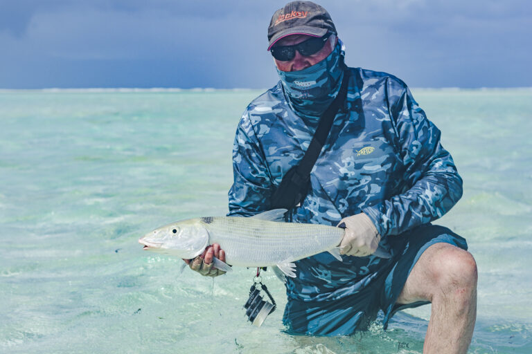 Nick Evans holding his catch