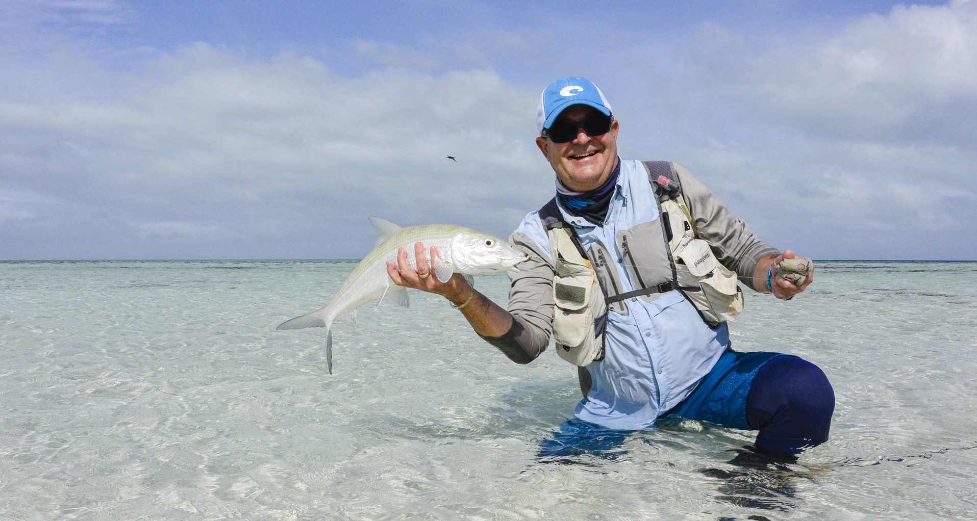 Angler showing off his bonefish catch