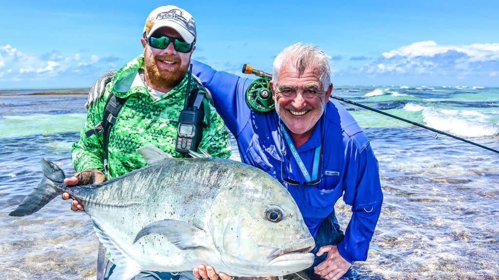 Anglers with a giant trevally at Farquhar