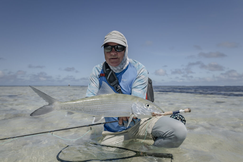 Fly fishing angler with a bonefish