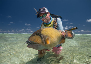 Angler with a triggerfish