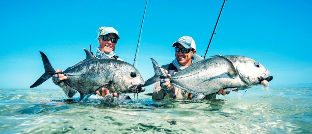 Anglers with giant trevallies