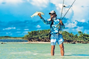 Keith Rose-Innes holding up a bonefish in the air
